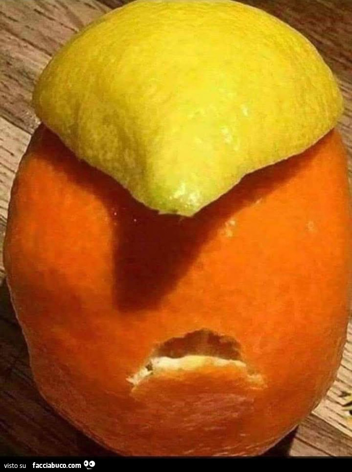 Arancio con cappelli di limone per creare Donald Trump